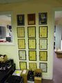 A few of the brewery's many prize certificates