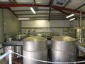 General view of the racking vessels and fermenters of the Brewery Design Services 45brl plant from the mashing stage