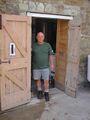 Owner Dave Yates poses in front of the brewery door