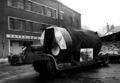 Delivery of a new package boiler. Parked in Hope Square waiting to be winched into position. The wall at the back of the photo, opposite the front of the brewery, was the coal bunker. Courtesy Geoff Martin.