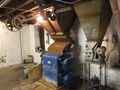 The four roller Boby malt mill grinds 2.5 tonne in 90 minutes. Note the old belt drives still in situ