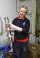 Assistant Brewer Amy Cockburn shows how yeast is fed into the conical fermenters