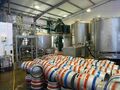 General view of the brewplant beyond a pile of washed casks
