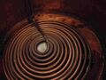 The coil in a jam boiler
