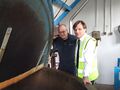 Brewer John Reed and MD Philip Lewis look into the mash tun