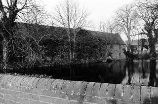 File:Rowsham Maltings side view across pond.jpg