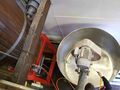 Flushing out the mash tun below the grist auger