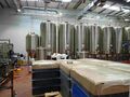 Another view of the secondary tanks beside the bottling line