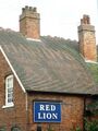 Red Lion, Riddings, 2021. Fading Hardy's sign on the roof.